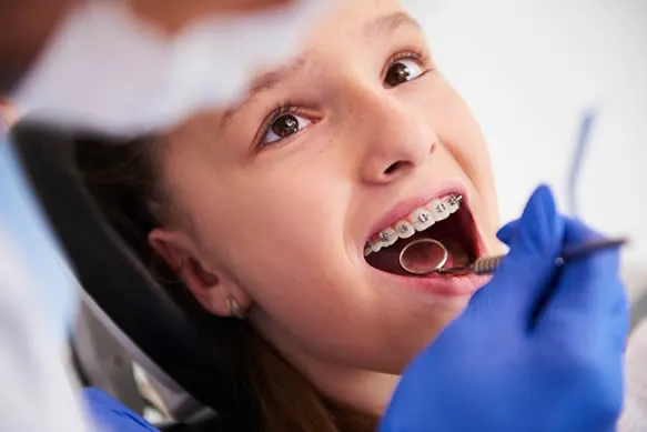 young girl at orthodontist